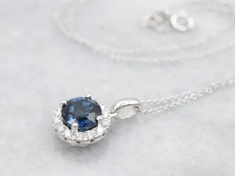 Luxury gemstone necklaces-Sapphire and Diamond Halo Pendant Necklace