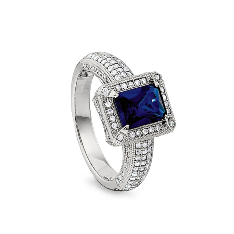 Men’s engagement bands-Platinum Finish Sterling Silver Micropave Emerald Cut Synthetic Blue Sapphire Ring with Simulated Diamonds