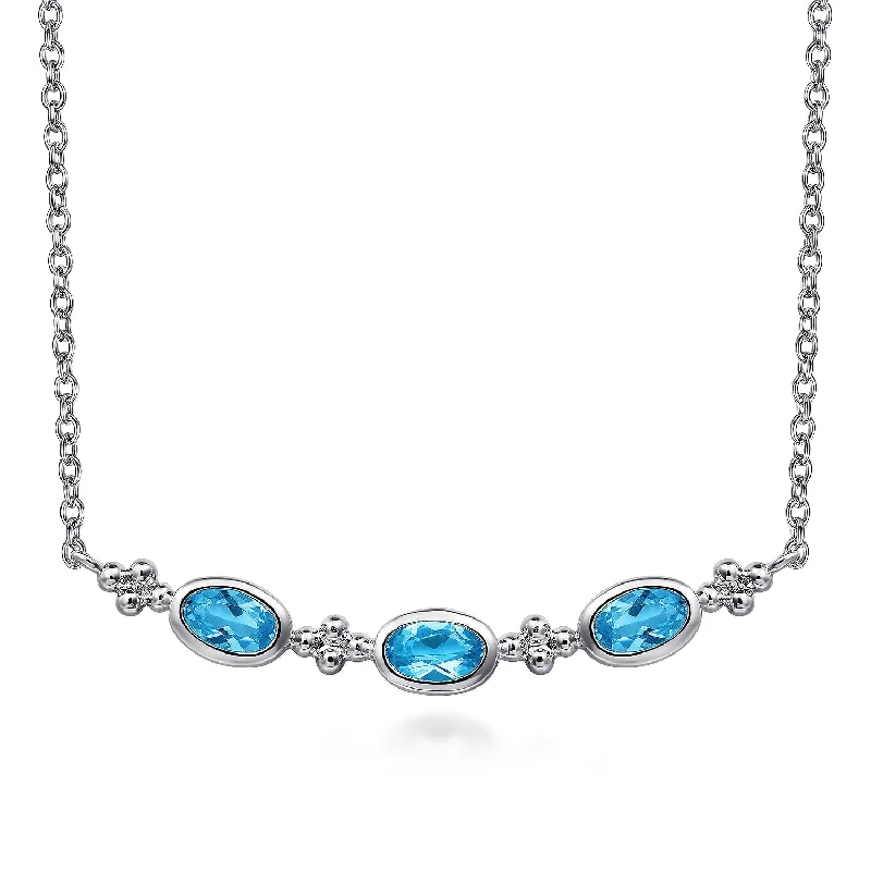 Custom name necklaces for kids-Blue Topaz Curved Bar Station Necklace in Silver by Gabriel NY