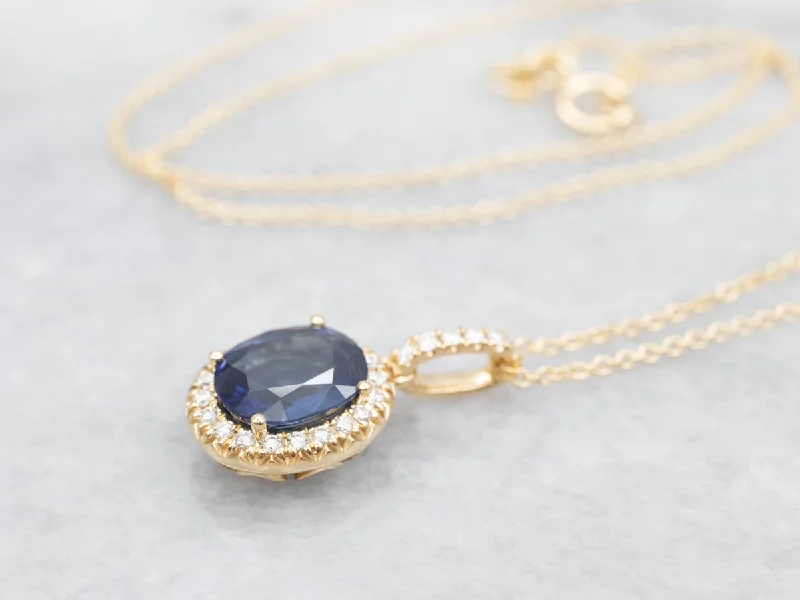 Handmade jewelry necklaces-Modern Gold Sapphire Halo Pendant Necklace