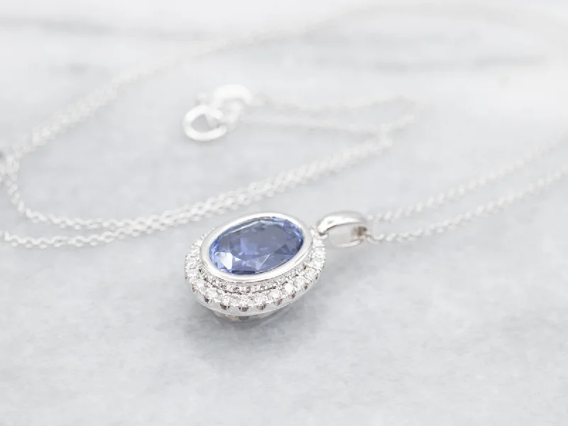 Fashionable gold necklaces for women-Bezel Set Sapphire Halo Pendant Necklace